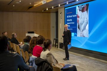 Margaret Faul speaks to ABE Master Teacher Fellows at a meeting at Amgen Massachusetts in April 2025.