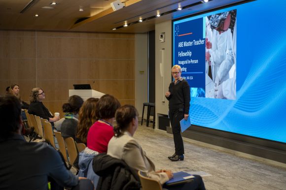 Margaret Faul speaks to ABE Master Teacher Fellows at a meeting at Amgen Massachusetts in April 2025.
