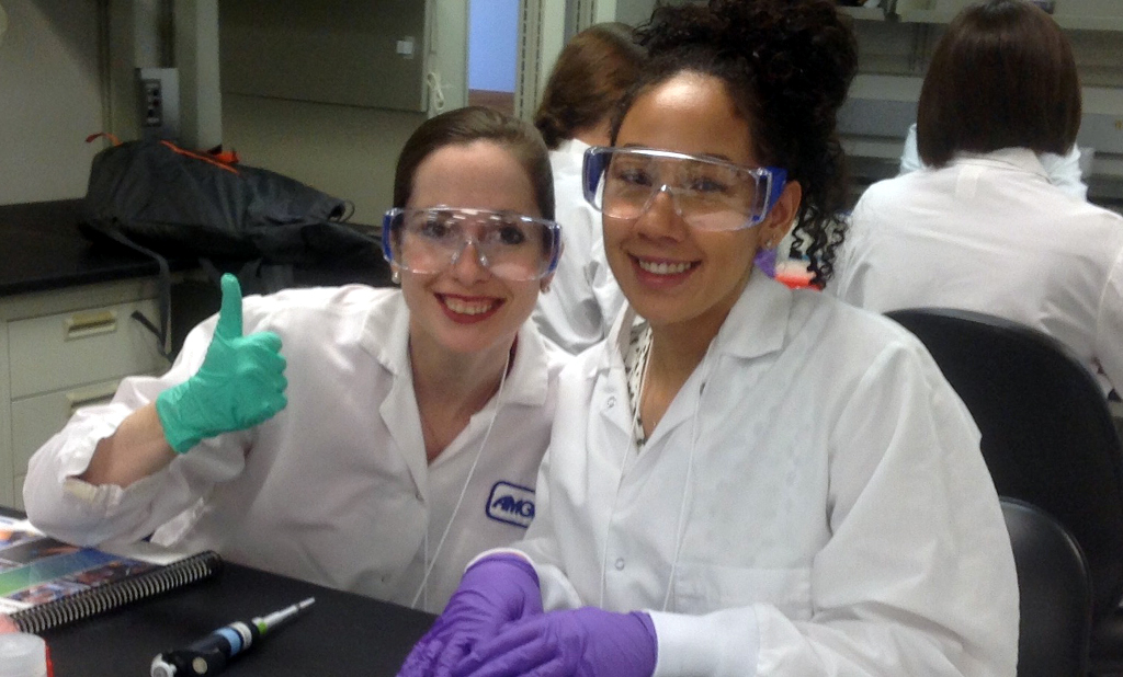 Two site staff in a lab