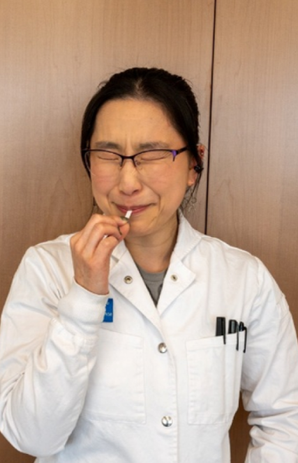 woman tasting bitter taste strip