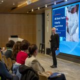 Margaret Faul speaks to ABE Master Teacher Fellows at a meeting at Amgen Massachusetts in April 2025.