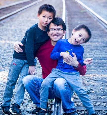 Zach Zhou and his sons