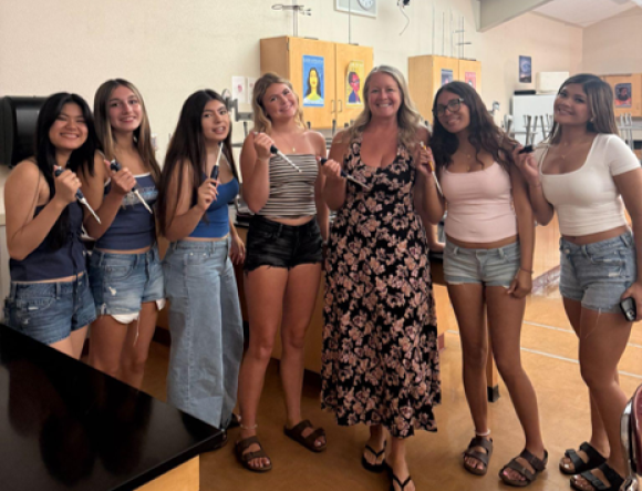 ABE teacher Corey Spainhower surrounded by her students at Liberty High School