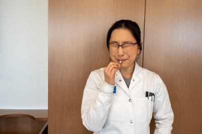 Making a face after tasting something very bitter